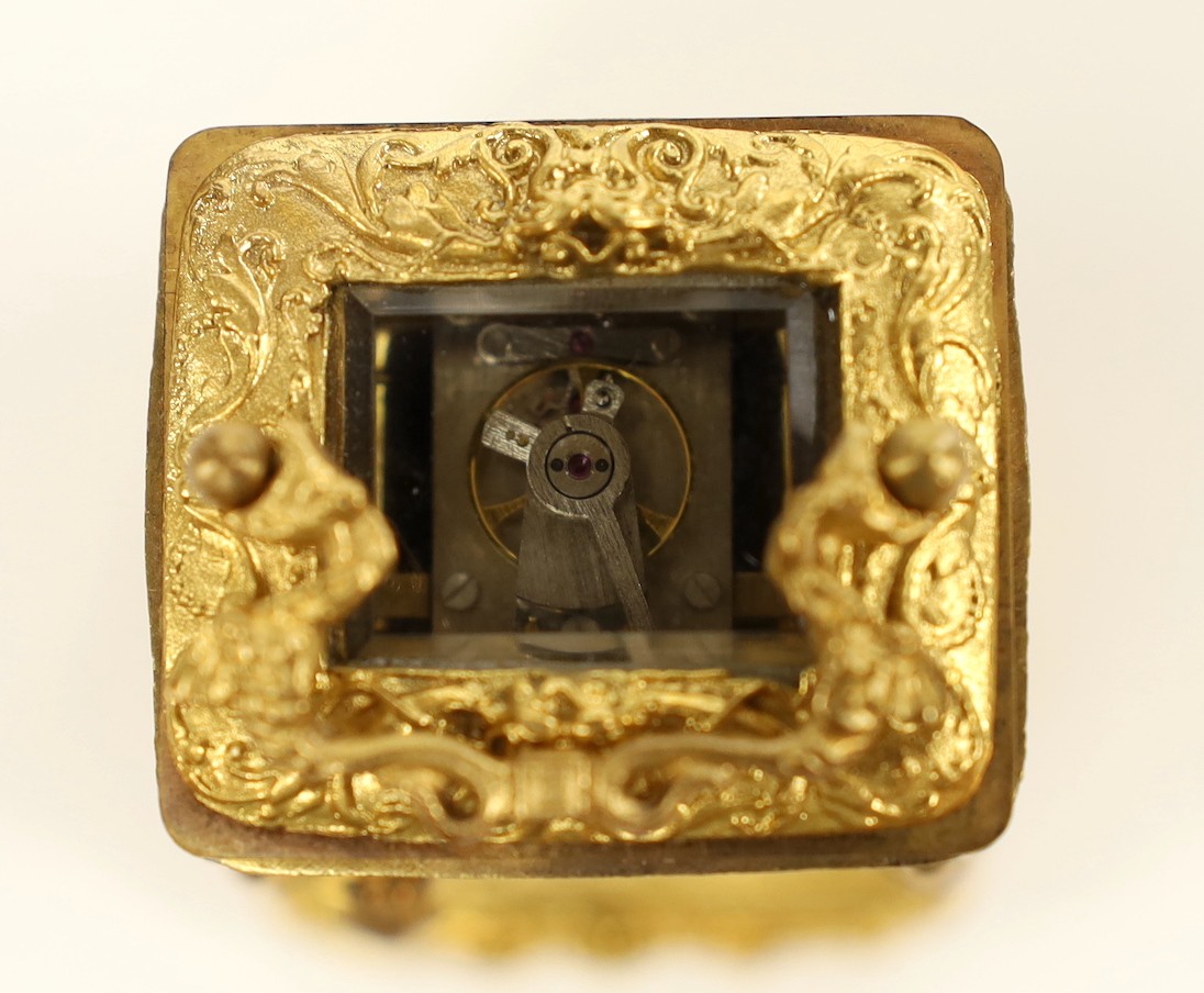 A miniature carriage timepiece, 7cms high